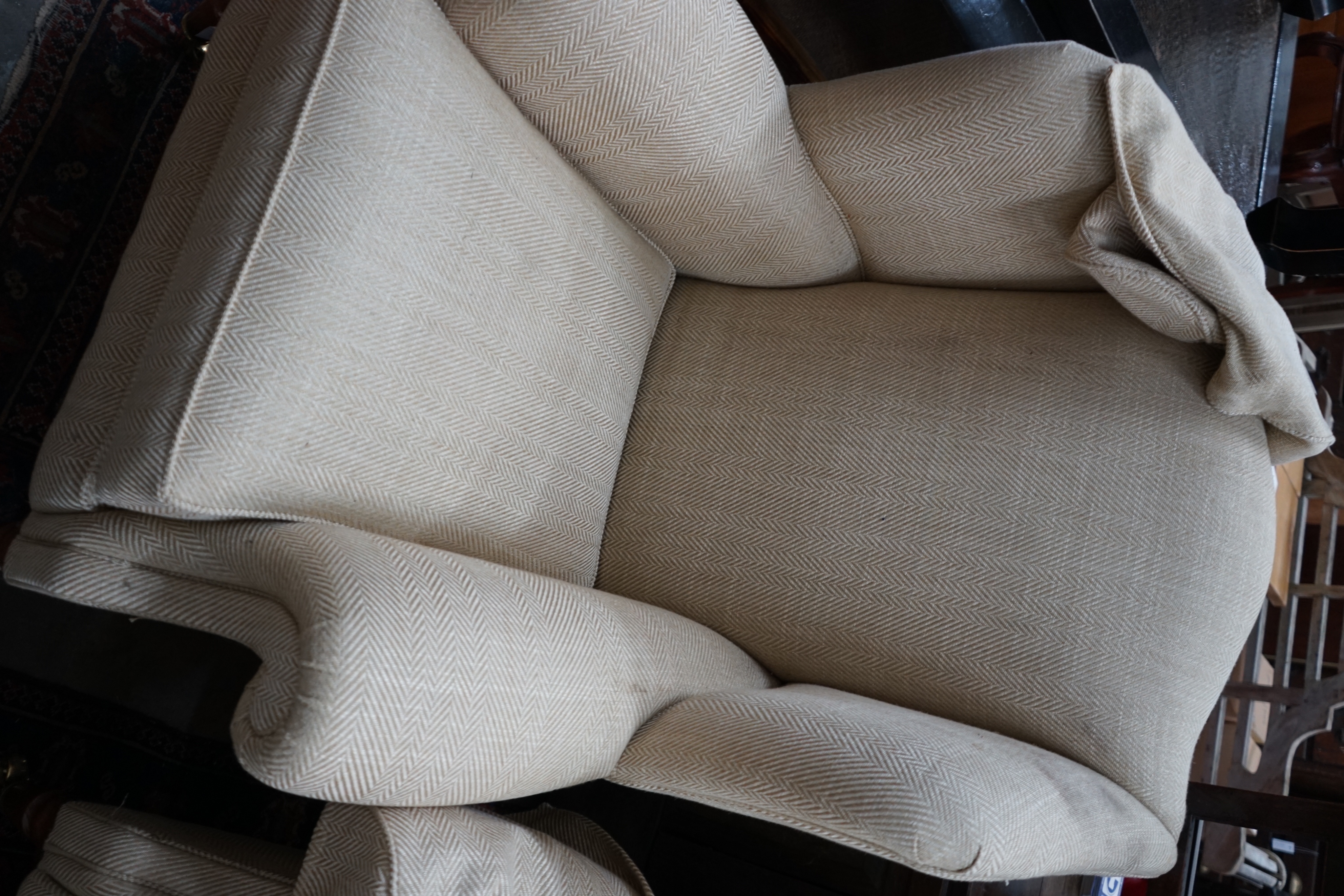 A pair of Duresta wing armchairs, upholstered in a natural herringbone fabric, width 92cm depth 80cm height 114cm